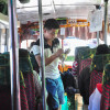 This Bus Conductor Never Hands out Paper Tickets But Only Lists Fare Payment on A Folded Sheet of...